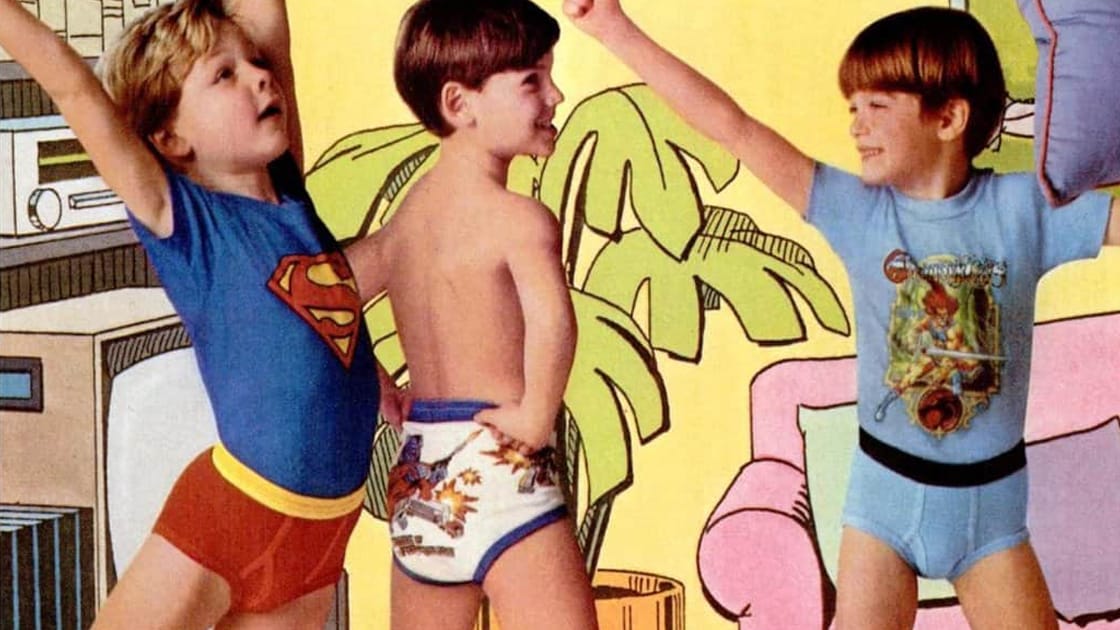 An excerpt from a 1980s Underoos print ad featuring boys wearing Superman, Transformers, and Thundercats Underoos.